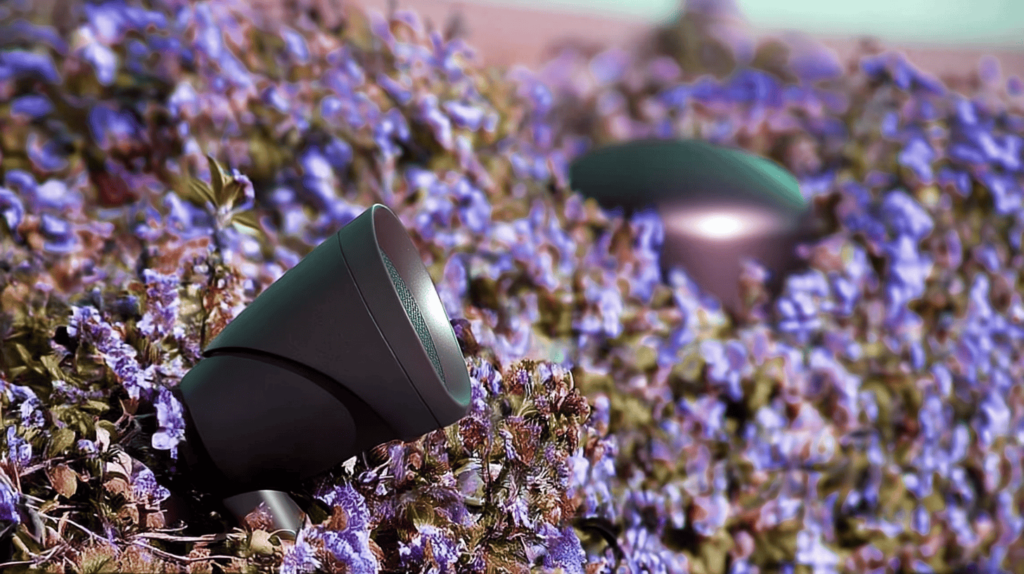 A complete outdoor speaker system, including several speakers and a subwoofer, designed for immersive exterior sound in a backyard